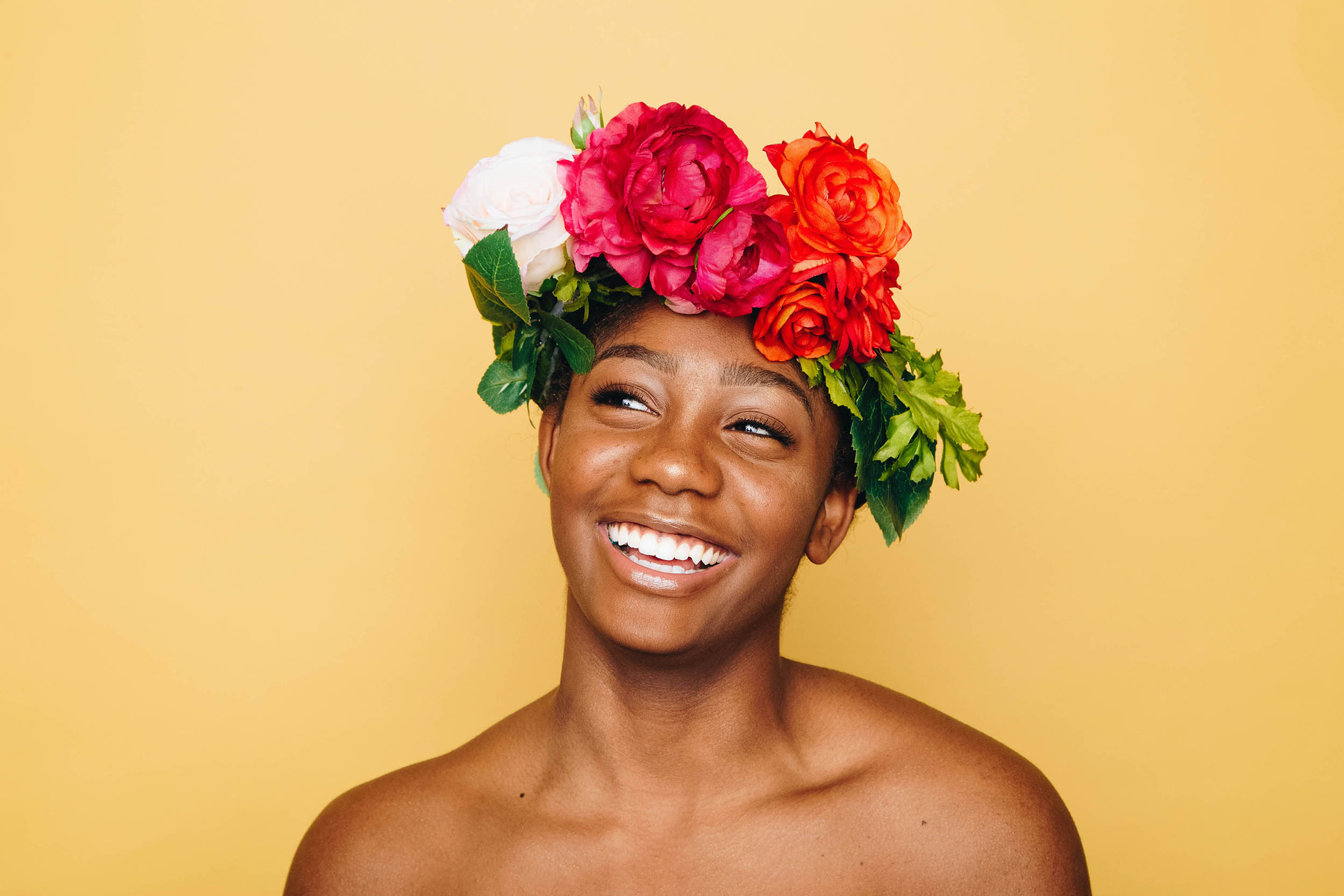 A lady smiling, indicating happiness.